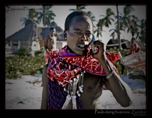 Young Masai calling from the beach Zanzibar, (c) Harry Kikstra, ExposedPlanet.com