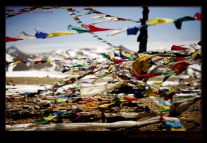 Buddhist prayerflags at the Lung La pass, Tibet. (c) Harry Kikstra, ExposedPlanet.com