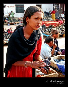 Nepali girl selling souvenirs at Kathmandu market © ExposedPlanet.com Images, all rights reserved