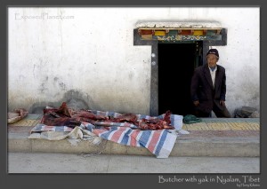 Tibetan butcher selling yak meat. © ExposedPlanet.com Images, all rights reserved
