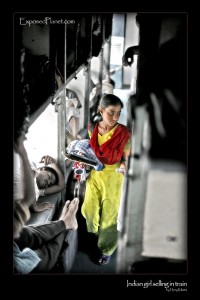 Girl selling goods in train, India © ExposedPlanet.com Images, all rights reserved